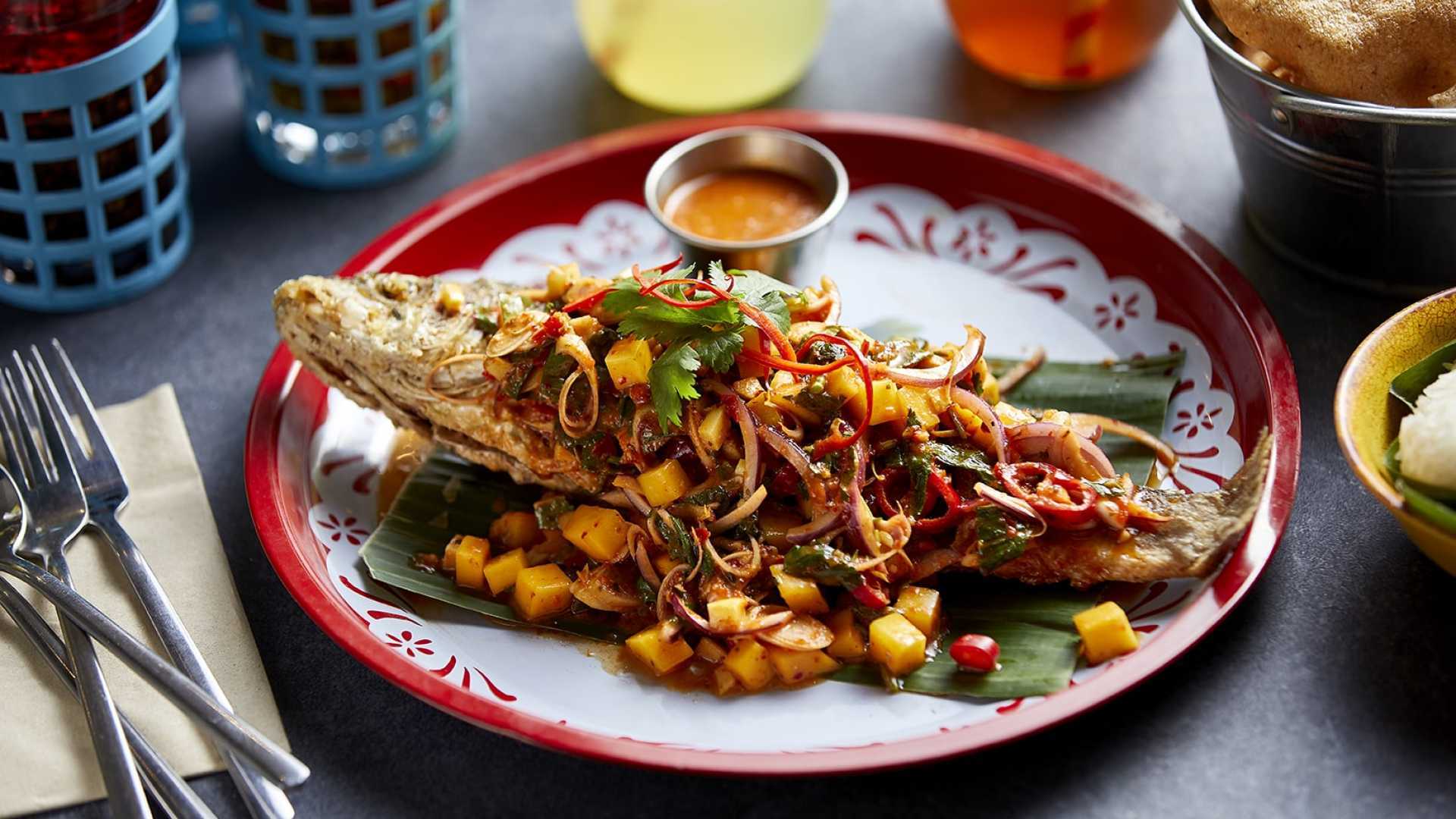 This is an image of a sea bass dish from Rosa's Thai's Isaan menu