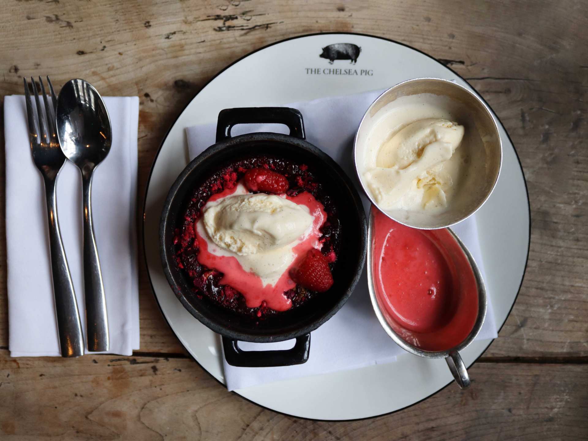 Red Velvet dessert of almond and dark chocolate cake, raspberry ganache, vanilla ice cream and rose crème anglaise