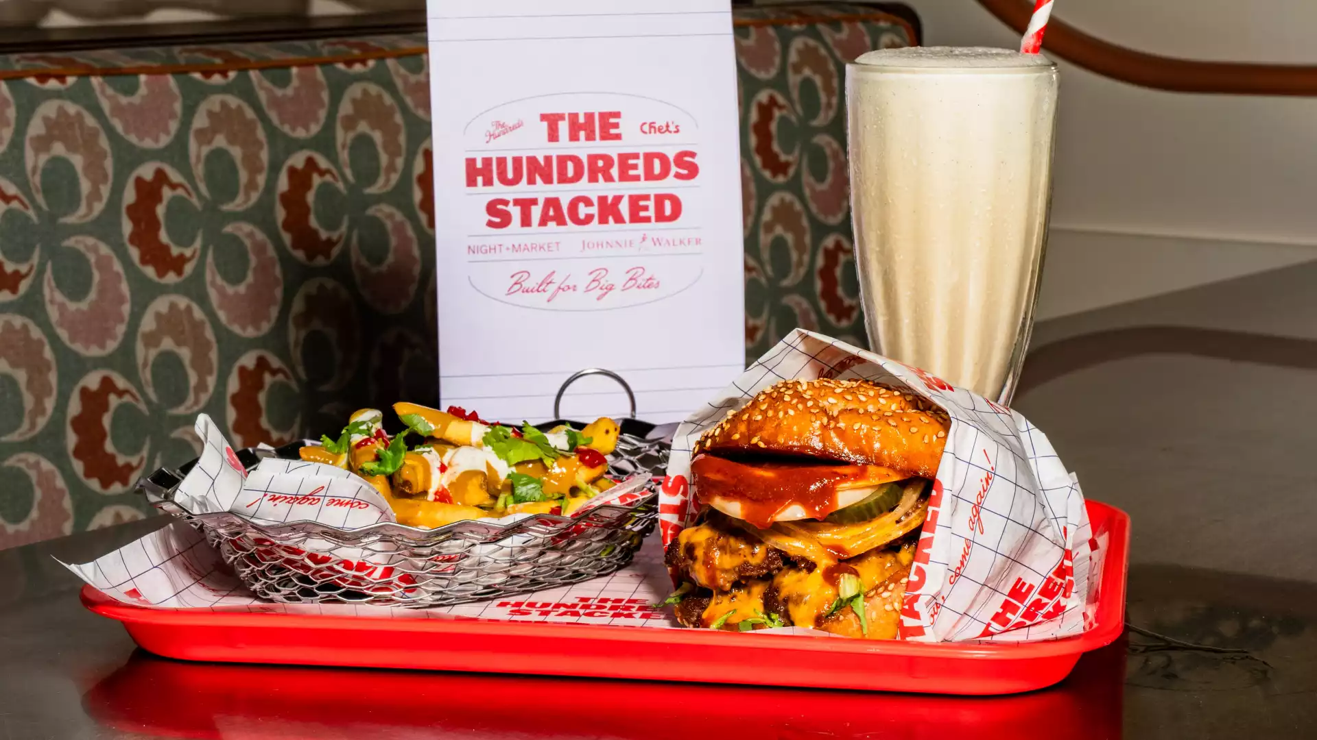 This is an image of a burger, fries and a milkshake from Chet's