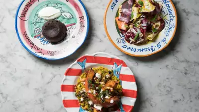 A photo of The Ninth's 'The Ninth Made Simple' at-home meal delivery dishes, including chocolate fondant and salads
