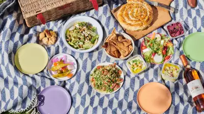 This is a picture of the picnic box from Arabica, including a Boregi, salad and hummus.