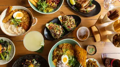 This is a photo of a food spread at Lahpet.