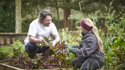 This is an image of chef Shaun Rankin in his kitchen garden at Grantley Hall