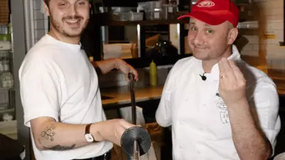 This is a photo of Aaron Potter from Wildflowers restaurant with a pizza chef from Franco Manca