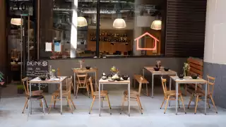 This is an image of the outdoor seating at Koya City in the Bloomberg Arcade.