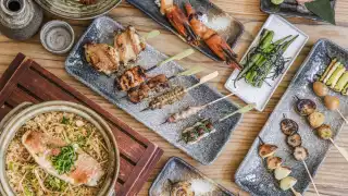 This is a photo of yakitori skewers and small plates from Junsei, Marylebone.