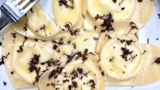 This is a photo of Pastaio's Valentine's black truffle and ricotta ravioli.