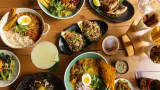 This is a photo of a food spread at Lahpet.