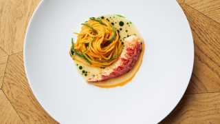 This is an image of a lobster pasta dish at Trivet restaurant