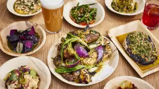 This is an image of a table of food at Acme Fire Cult
