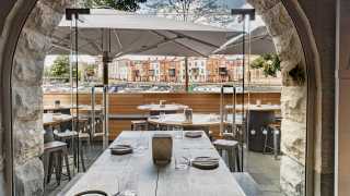 Colour image of the waterside terrace at Paco Tapas, Bristol