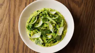 A photo of a green risotto primavera from all'onda