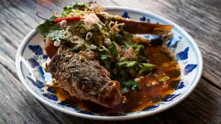 This is a photo of Isaan-style deep fried seabass at som saa