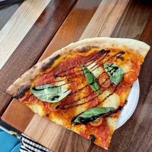 A slice of 'Caprese in Love' pizza from Civerinos Slice, Edinburgh